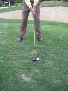 golf ball position inside left heel