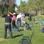 younger golfers hitting drivers and practicing golf strategy