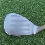 club face of a high lofted golf wedge