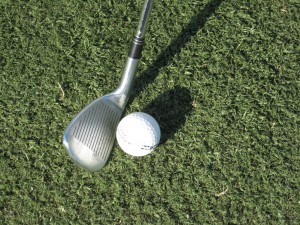 where to aim on the golf ball at impact