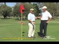 Bobby-Schaeffer-giving-golf-tip